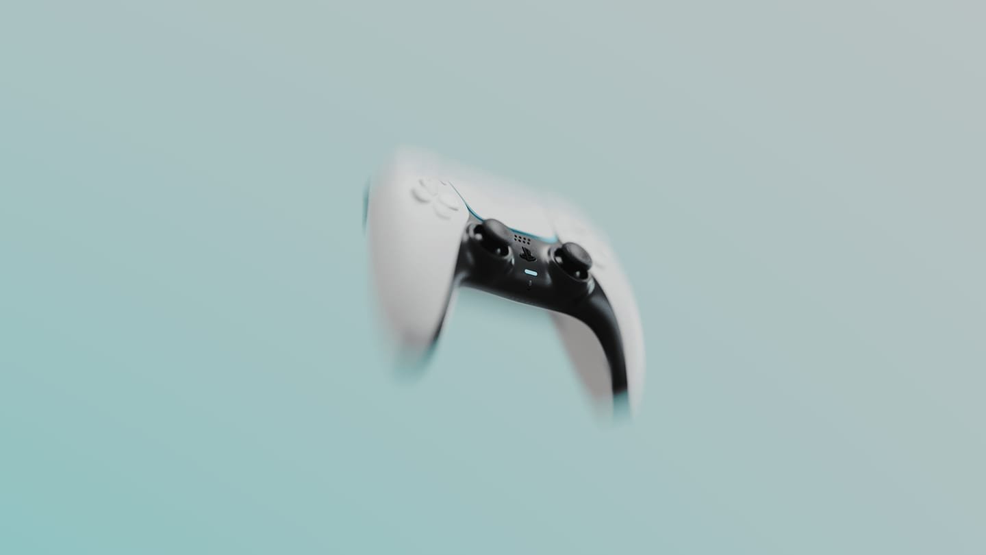 Joystick DualSense blanco pequeño y fuera de foco, flotando sobre un fondo celeste
